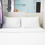 Comfortable 2BR Mutiara Bekasi Apartment By Travelio